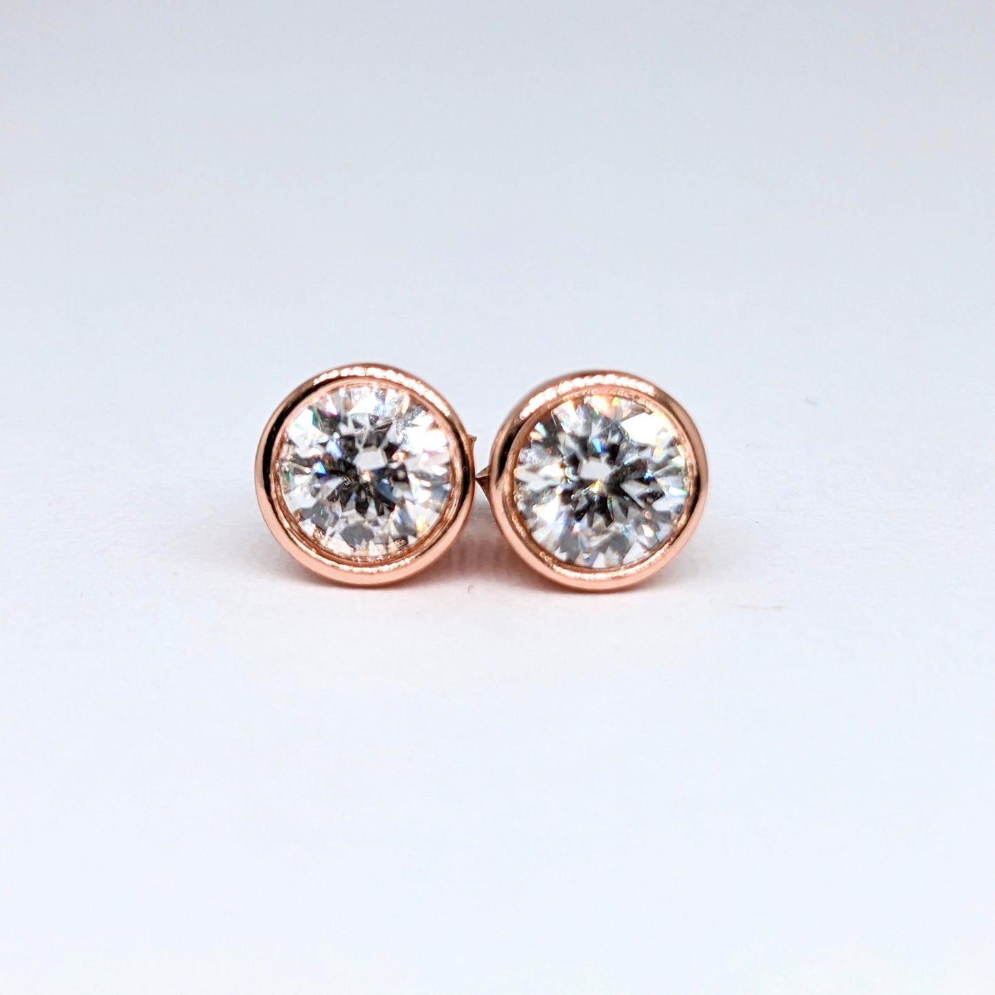 0.5ct/1ct White Moissanite Round Bezel Studs